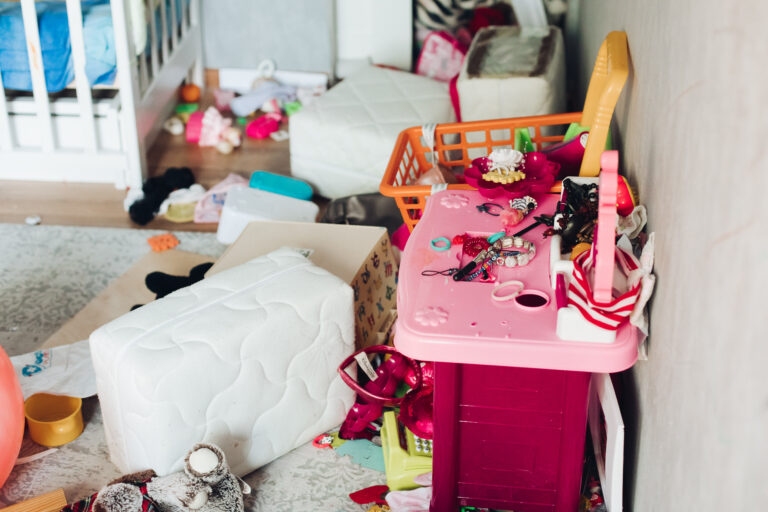 Fragment of a photo of a children's room with scattered things and toys