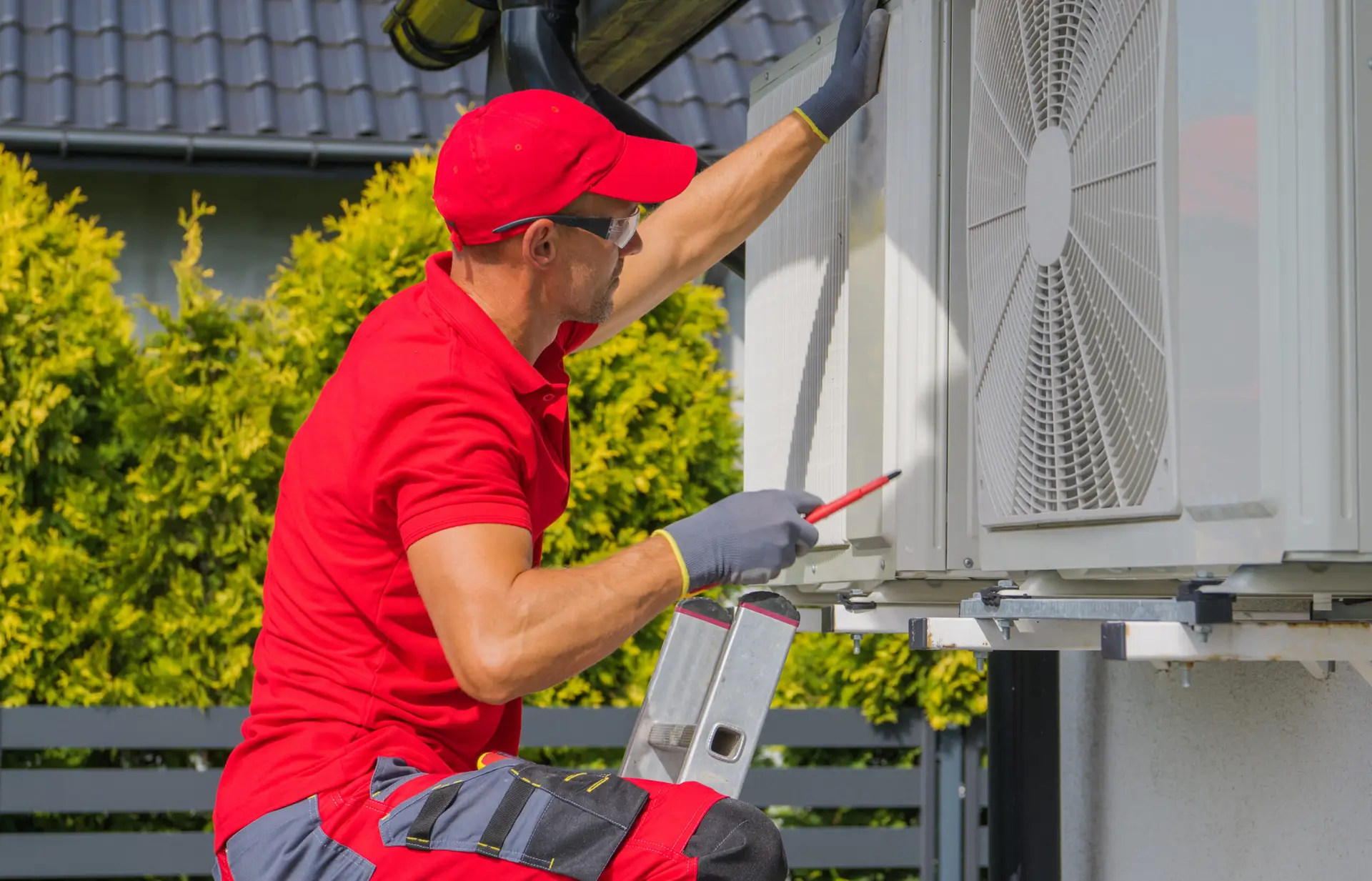 HVAC contractor reviewing social content strategy — seasonal planning is what separates companies that own their market from those that don't