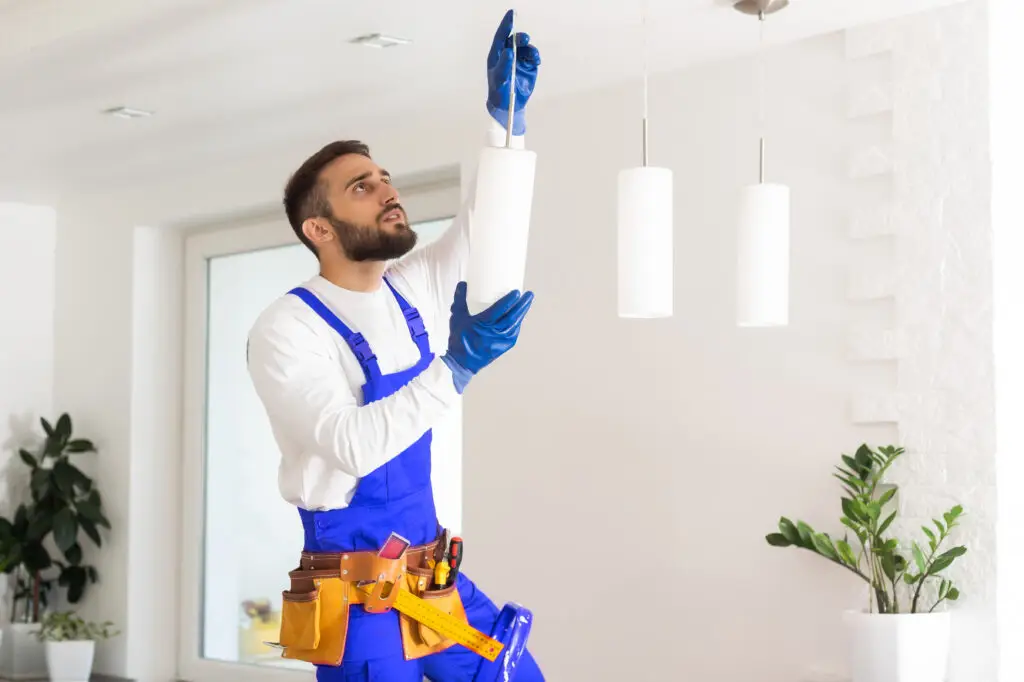 Tampa electrician installing LED lighting after a new conversion-focused website landed the job