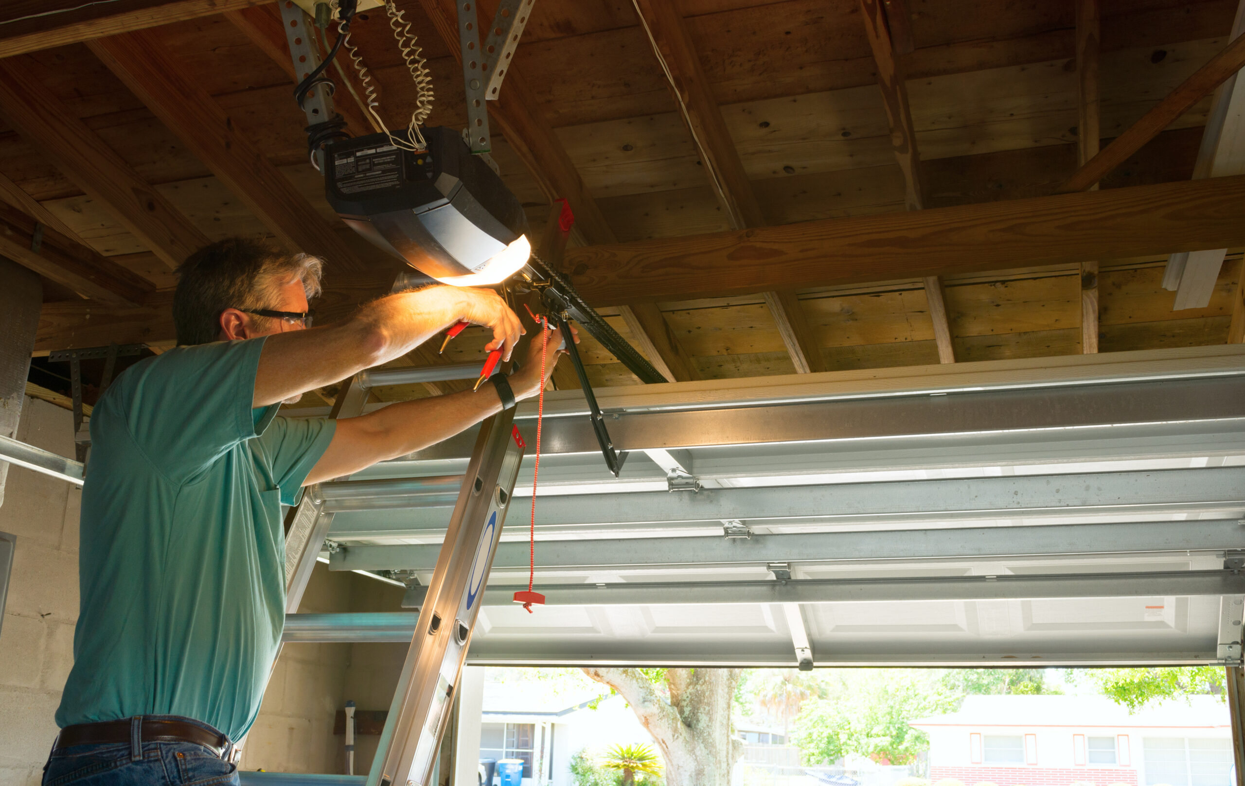 Tampa Bay garage door repair company owner reviewing organic ranking results after garage door SEO company campaign outranked national lead-gen platforms and captured emergency repair calls across Hillsborough County