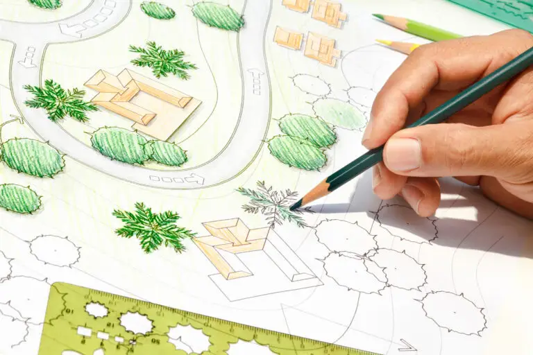 Landscape Architect Designing on site analysis plan after landscaping web design services created a site that filled their calendar with work.